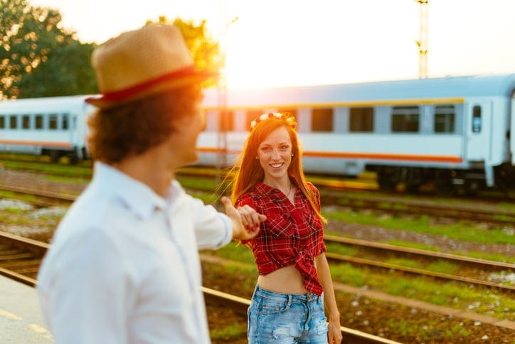 Romance at train station in summer