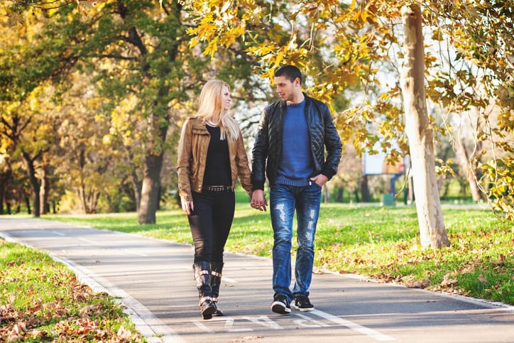 Young couple walking in the park