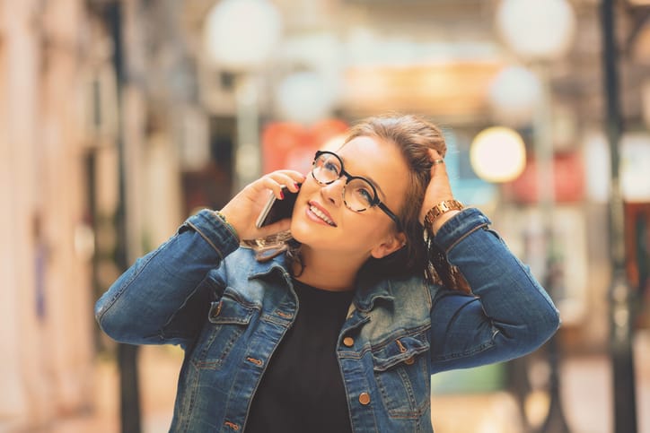 young woman happy phone