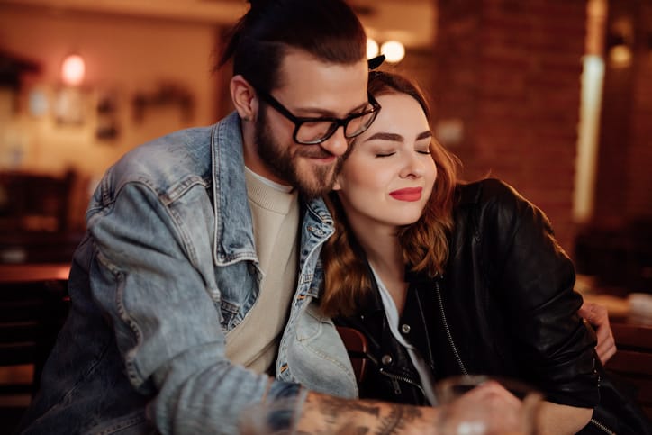 couple cuddling on romantic date