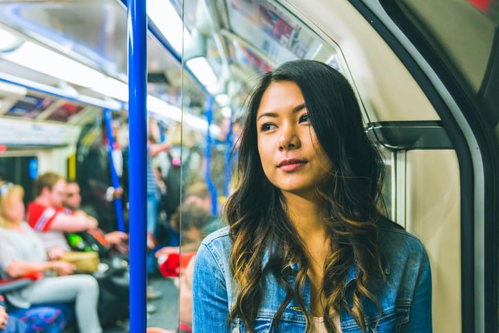 young woman tube travel london