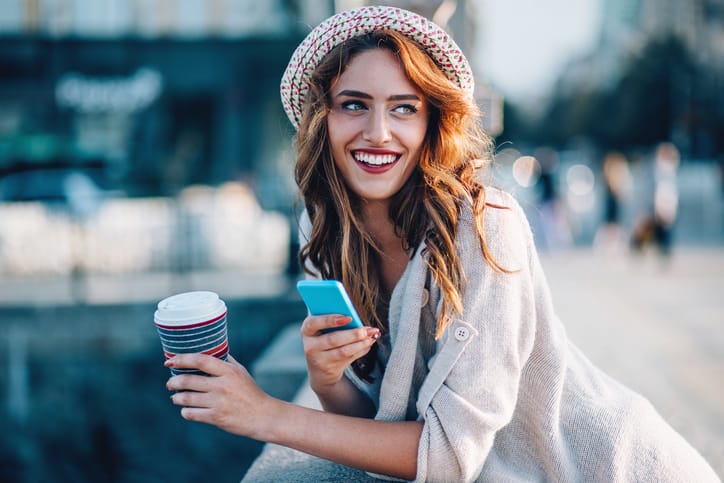 Smiling woman at urban scene
