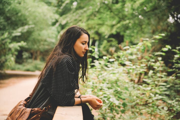Young woman enjoying the nature in Berlin Tiergarten park.