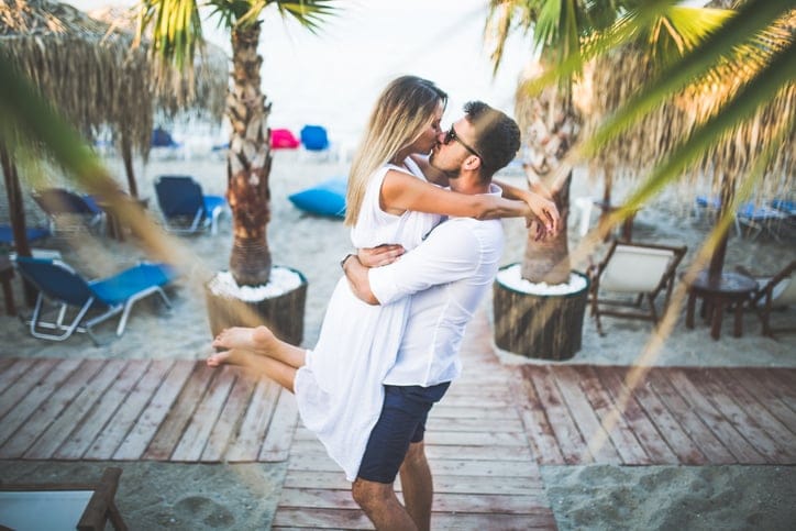 Photo of loving couple on the beach