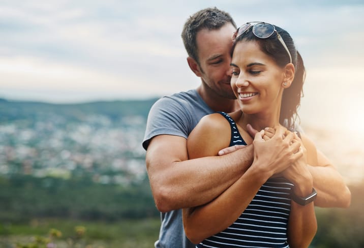couple embracing outdoors