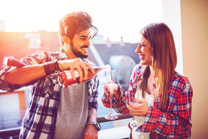 young couple dating wine happy