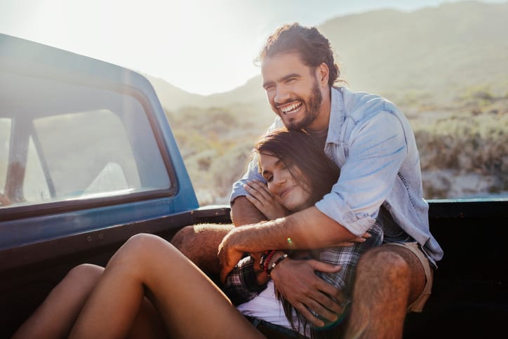 Close up of a couple on a road trip