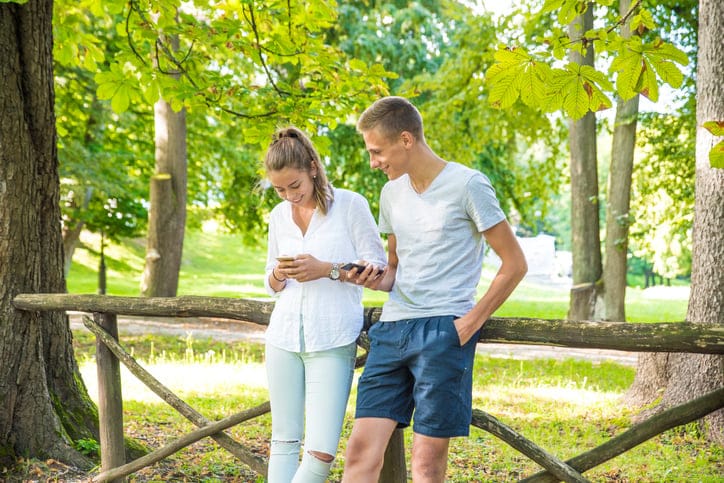 Two smiling in the park