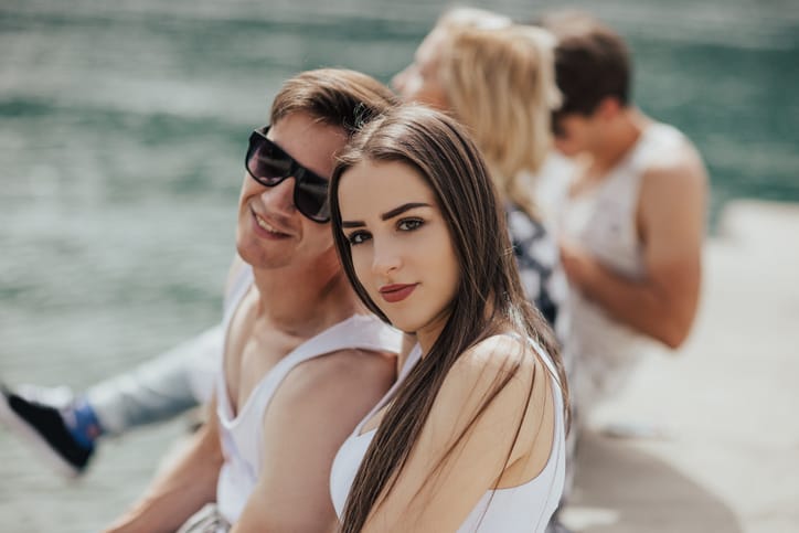 Two couples on a double date near the lake