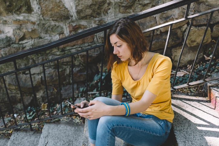 Teenage girl feeling depressed outside