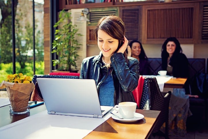woman laptop coffee shop