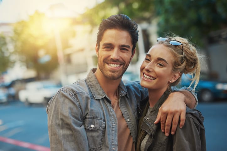 Shot of a young couple out in the city