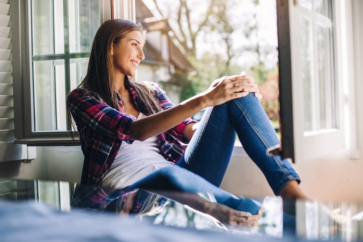 Young woman enjoying the country side view