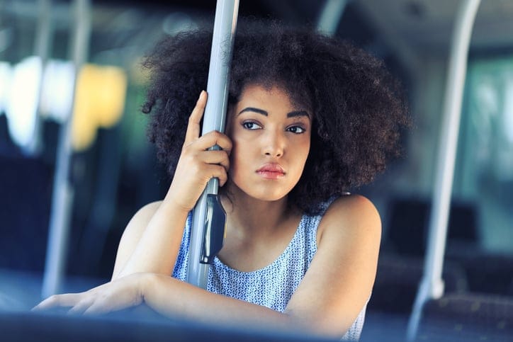 young woman traveling with public transport.