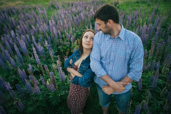 Young couple in love walking in the sunset