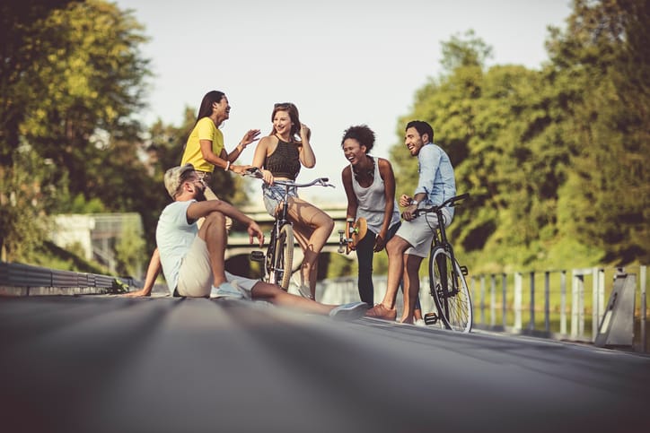 Multi-ethnic group of friends hanging out on the street