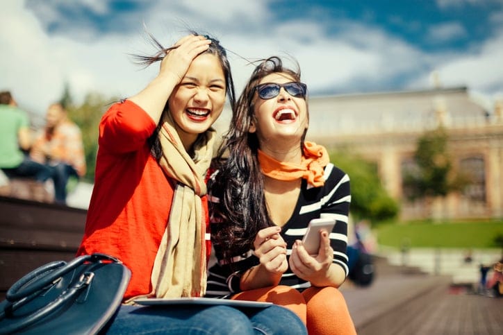 Student girls having fun outdoors