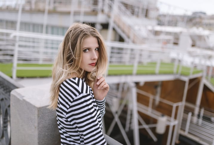 Outdoors portrait of beautiful young woman. Selective focus.