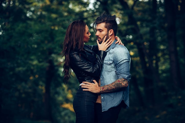 Young couple hugging in the park