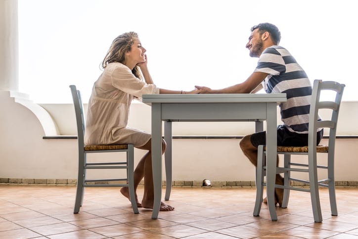 Meal time of a young couple during holidays