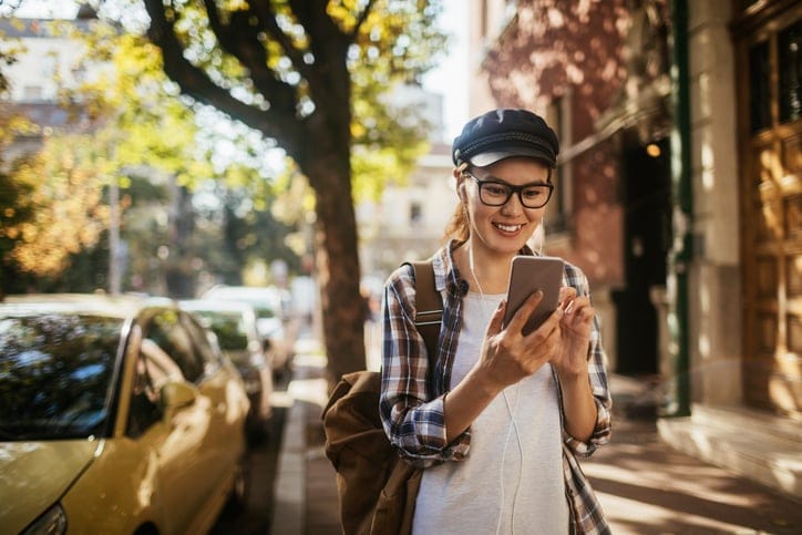 Close up of a woman using a phone