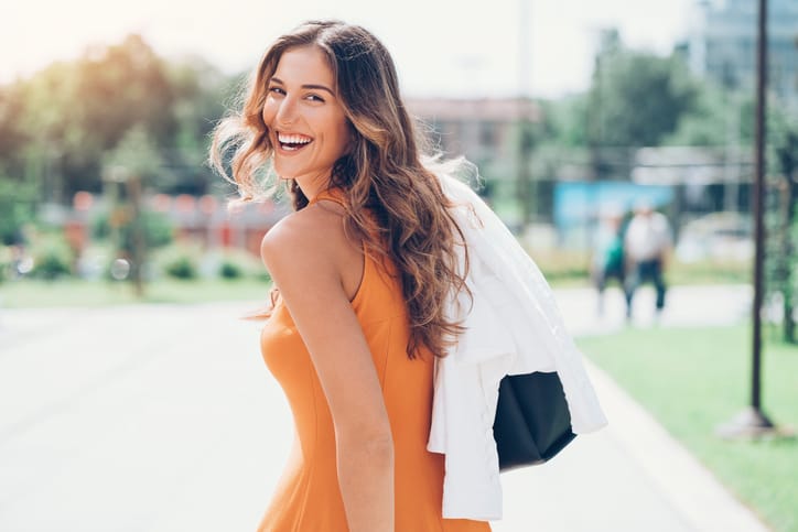 Beautiful young woman outdoors on a sunny day