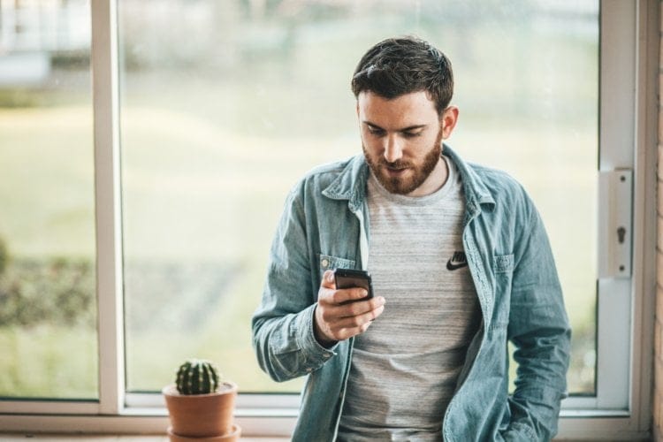 man texting