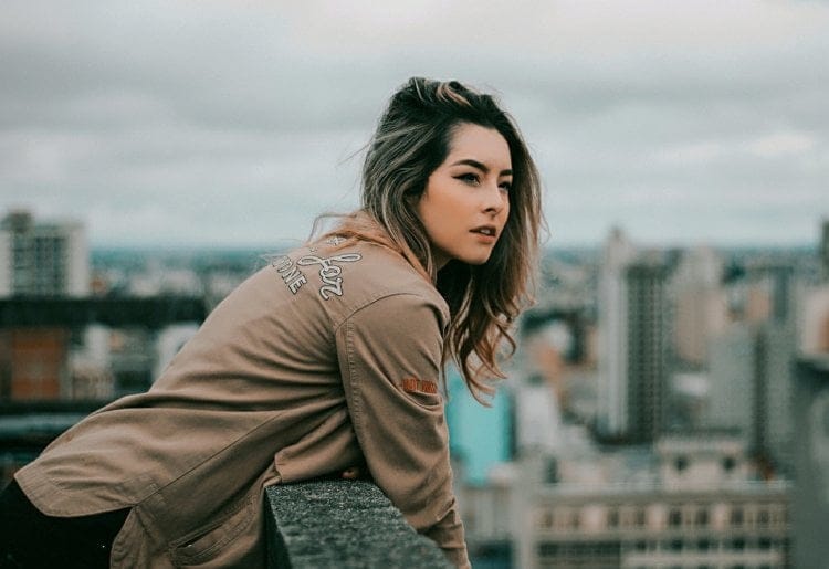 girl thinking bridge