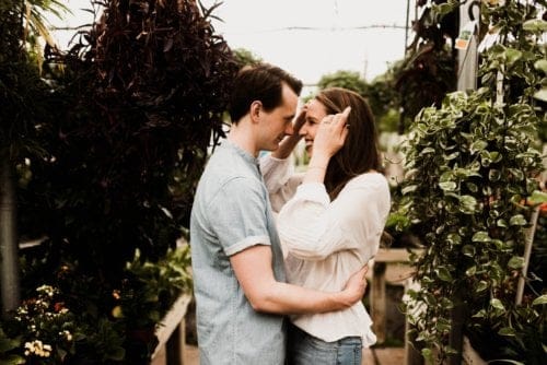 Couple kissing in garden