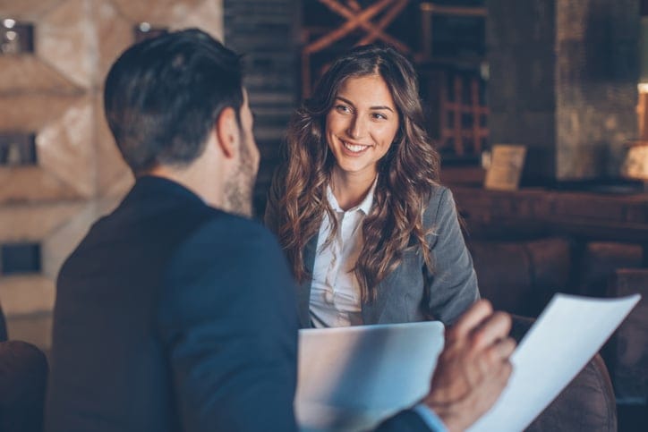 Woman having a meeting with her boss.