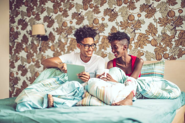 couple bed happy
