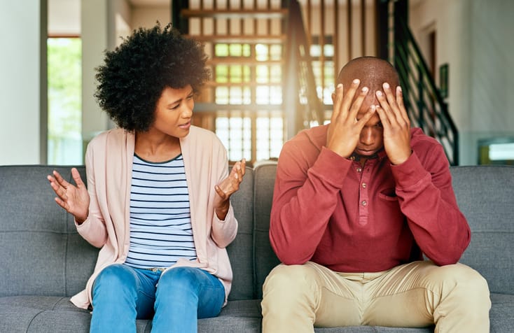 Shot of a young couple having relationship problems at home