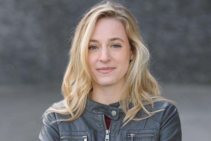 blonde woman facing camera