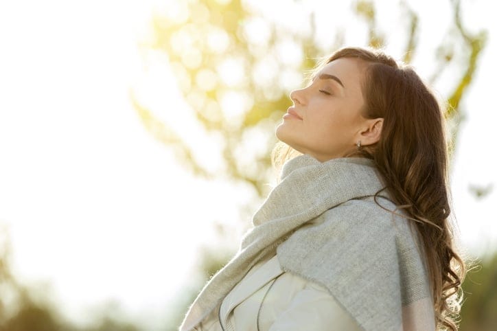 woman looking to the sky