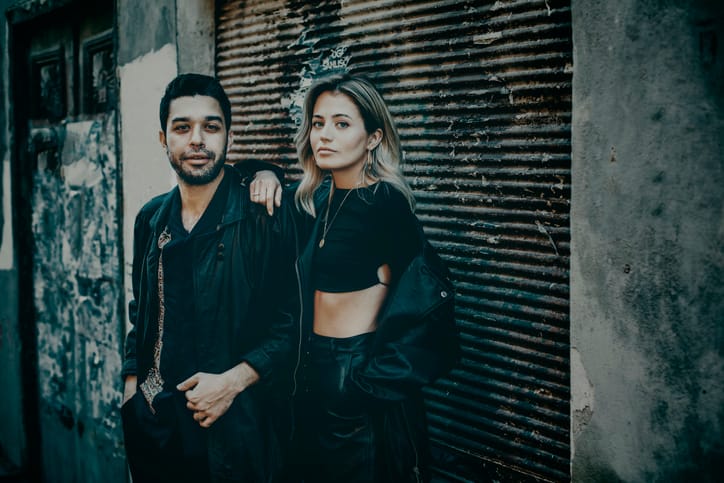 young hipster couple looking serious