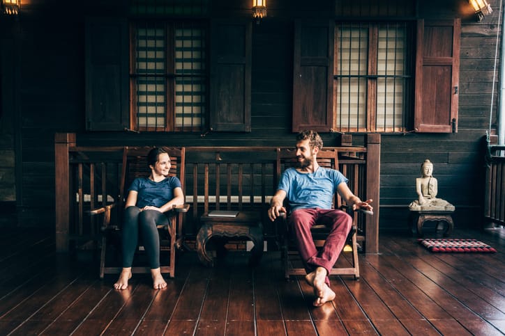 couple sitting in chairs on a date