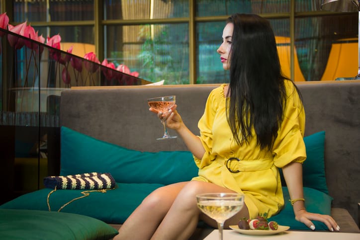 Woman at a hotel bar.