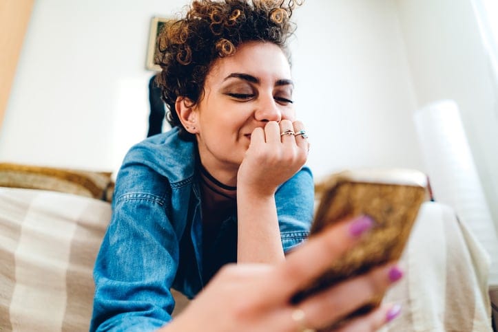 woman holding mobile phone