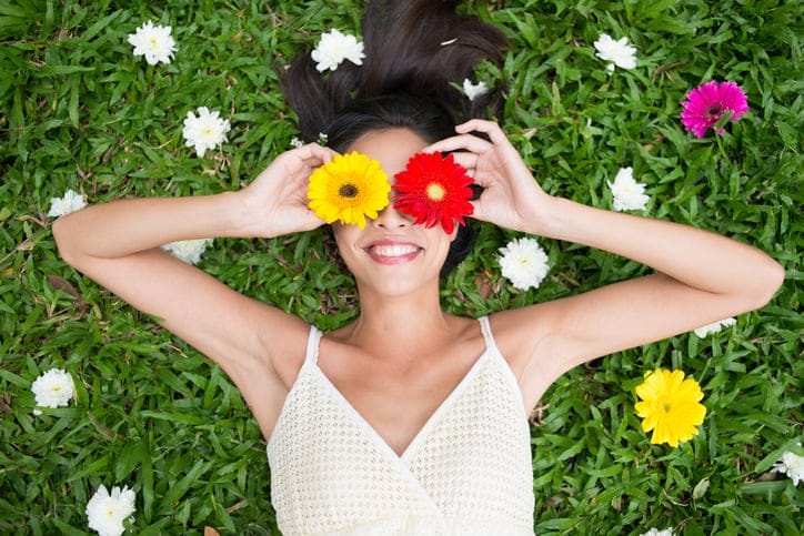 woman being silly in the grass