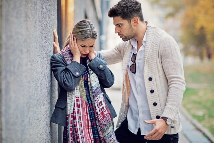 couple aruging in the street