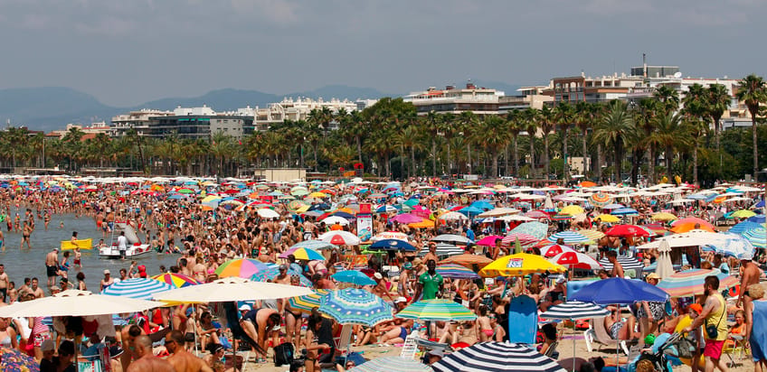 People relaxing and having fun on the beach.