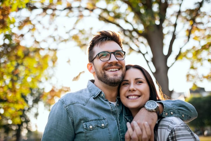 happy couple embracing autumn day