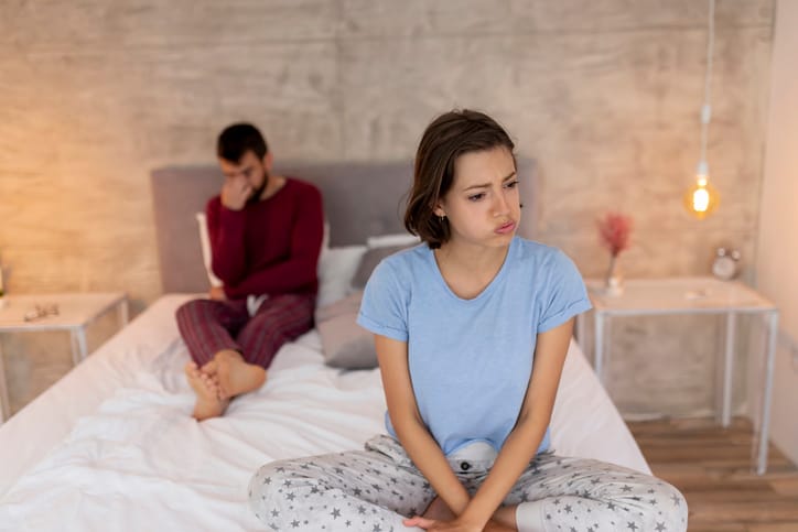 couple unhappy in the bedroom