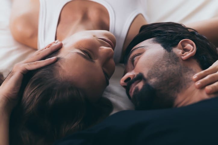 couple laying in bed