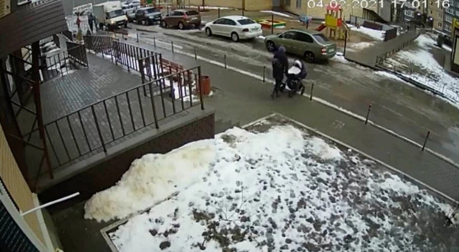 picture of baby in pram in the street