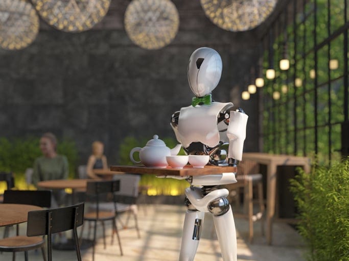 A robot sitting in a restaurant.