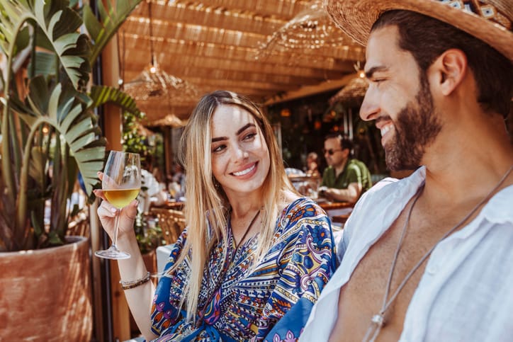 man flirting with woman at resort