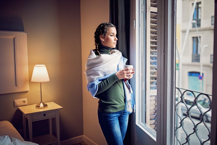 woman looking out of a window