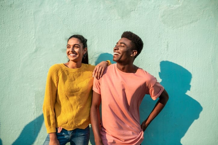 mixed race couple laughing