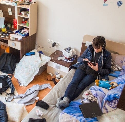 teenage son in his bedroom